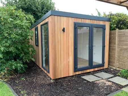Compact wooden garden room