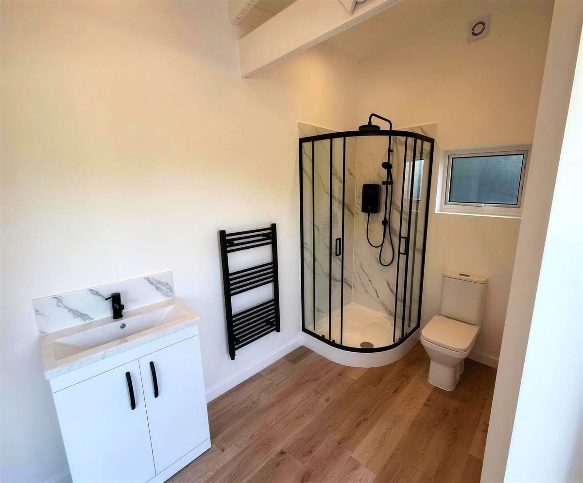 Shower room in the barn conversion for pool users