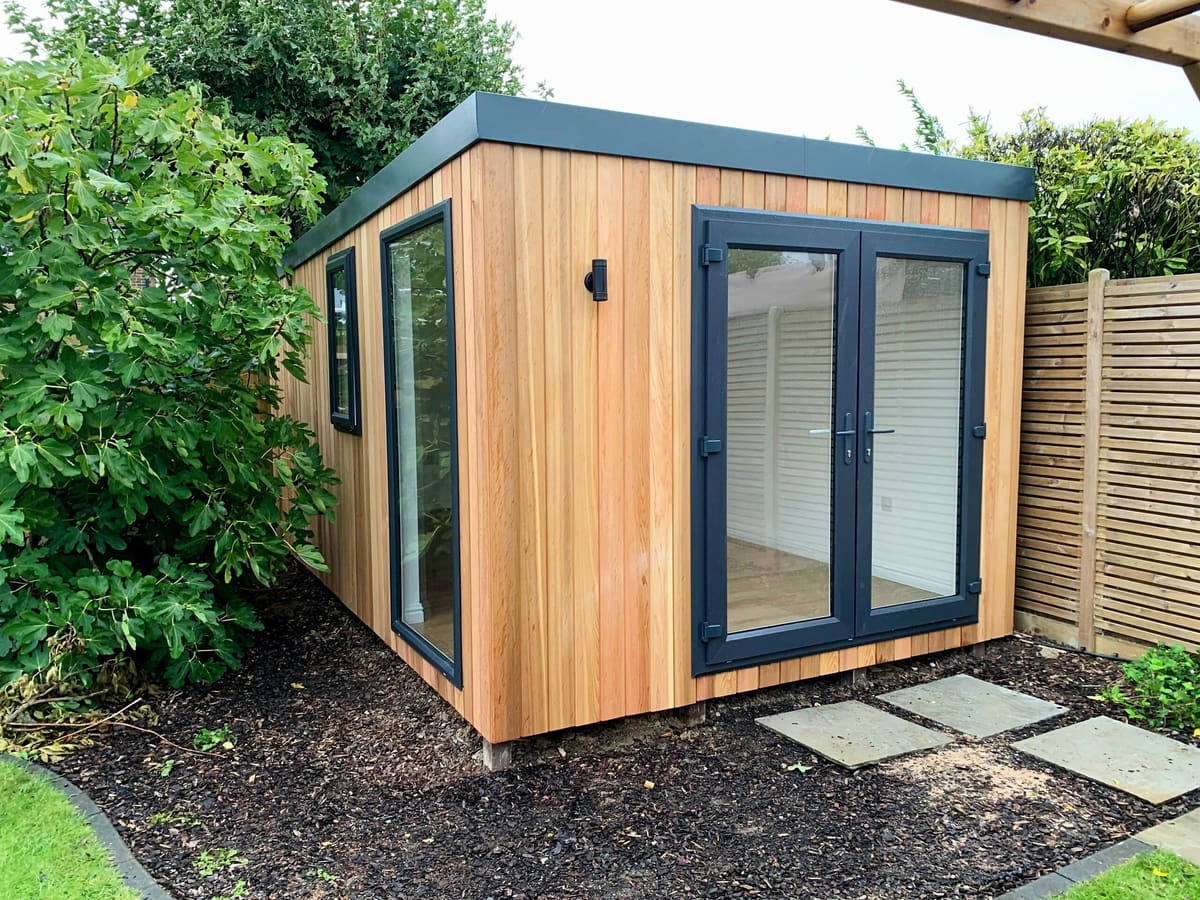 Compact wooden garden room