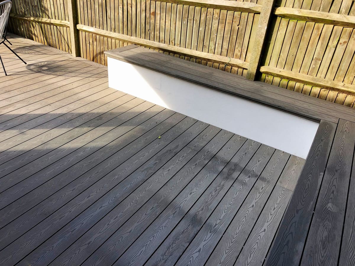 Composite decking with a built-in white bench